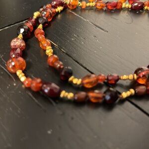 Necklace with  colored stones and gold accents
